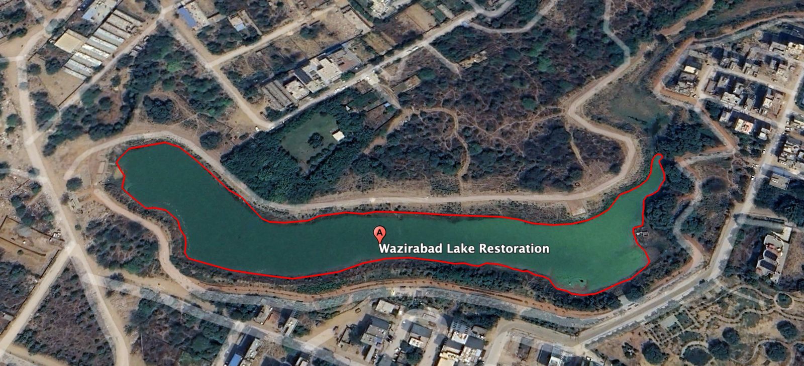 Satellite image of Wazirabad Lake in 2024 with the smaller water surface outlined in red